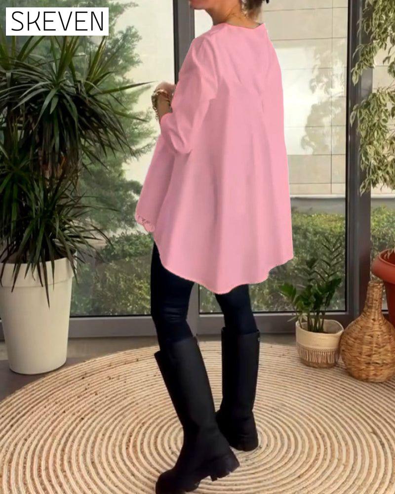 Solid color commuting top