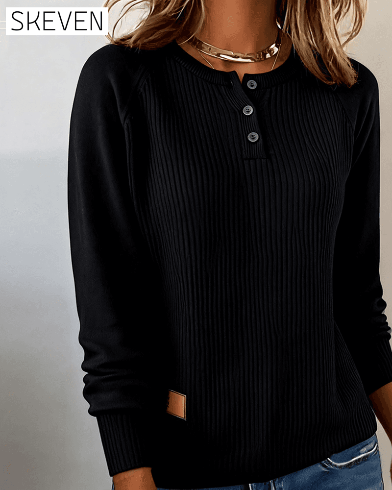 Stilvoller Pullover mit Raglanärmeln und Knopfleiste