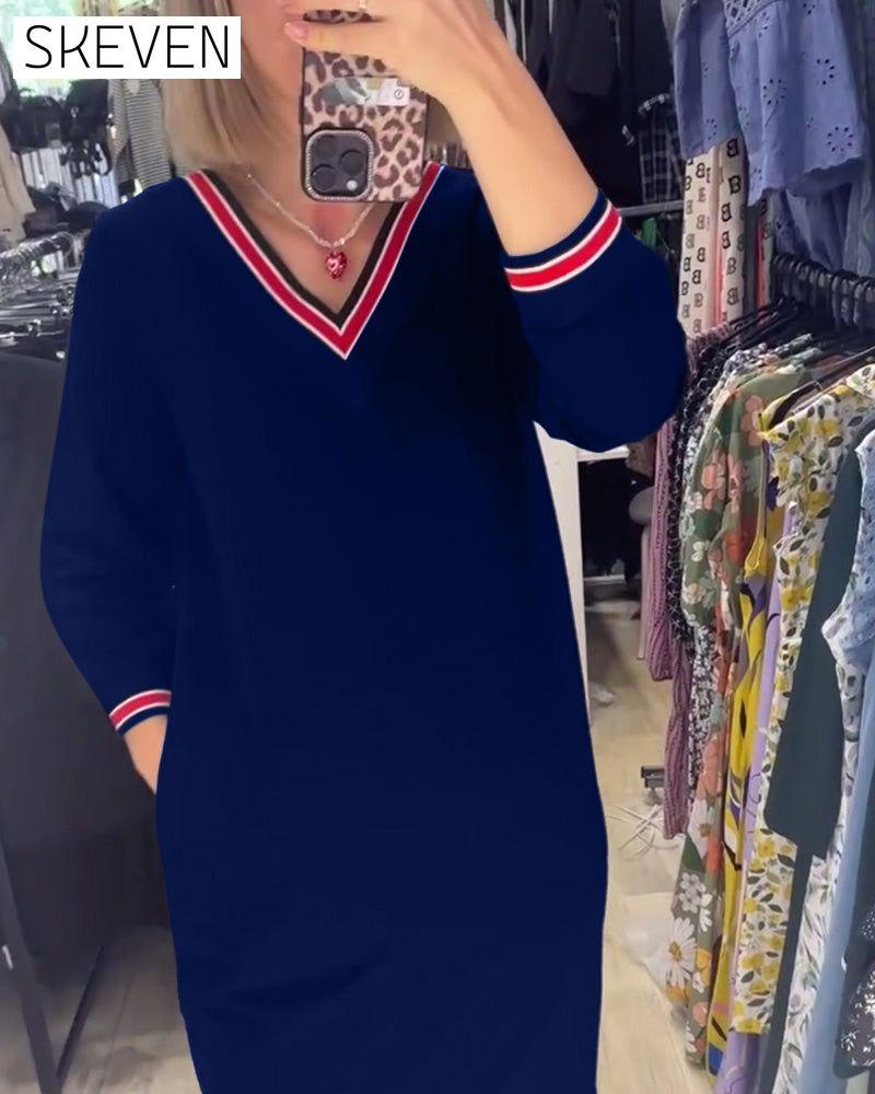 Robe élégante à col en V avec poches