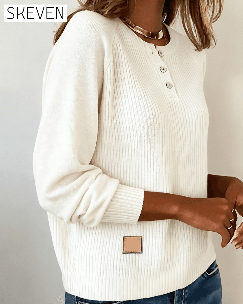 Stilvoller Pullover mit Raglanärmeln und Knopfleiste