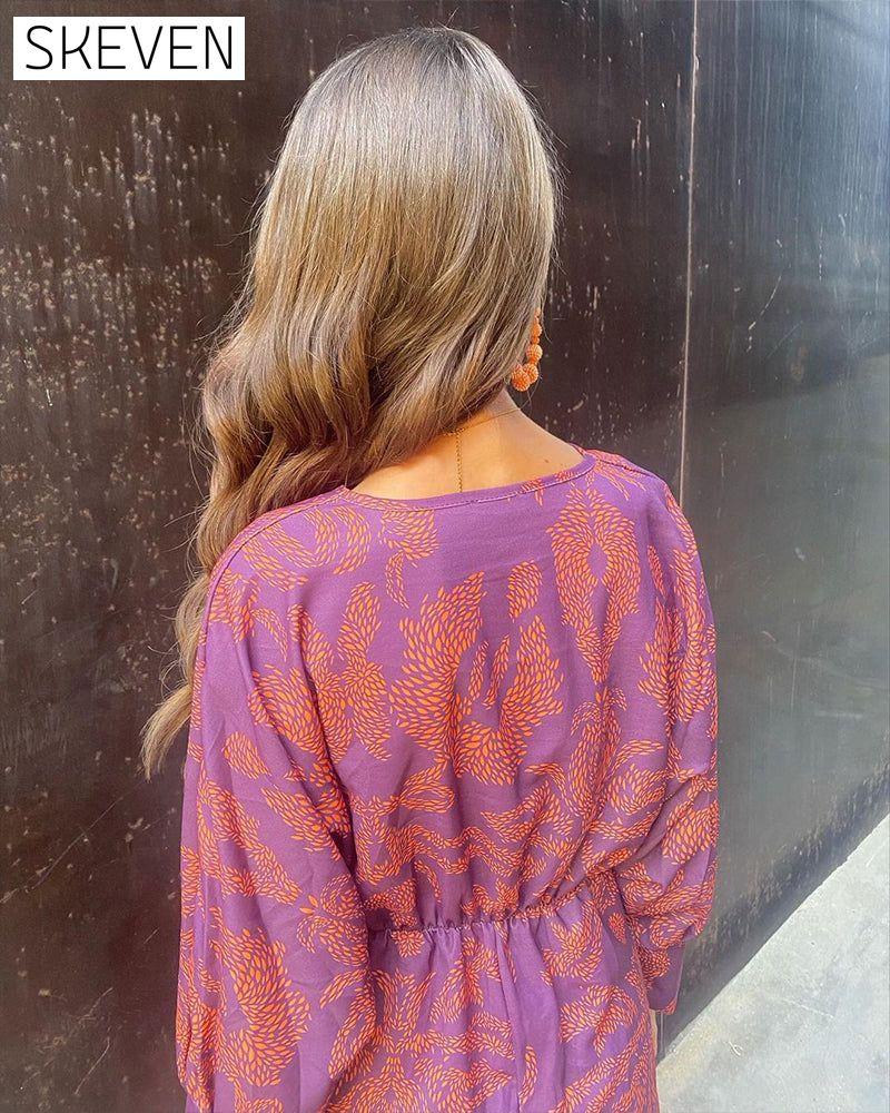 Elegantes Vintage-Kleid mit Print, V-Ausschnitt und langen Ärmeln