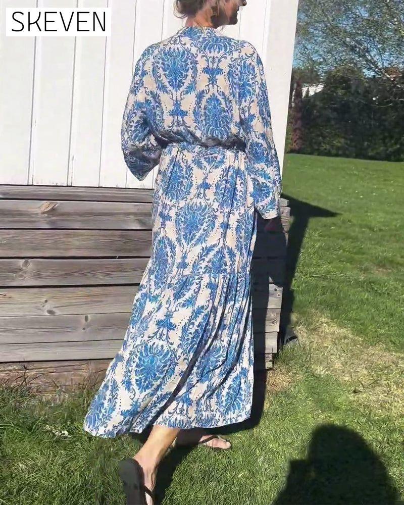Bedrucktes Kleid mit Glockenärmeln und Kordelzug