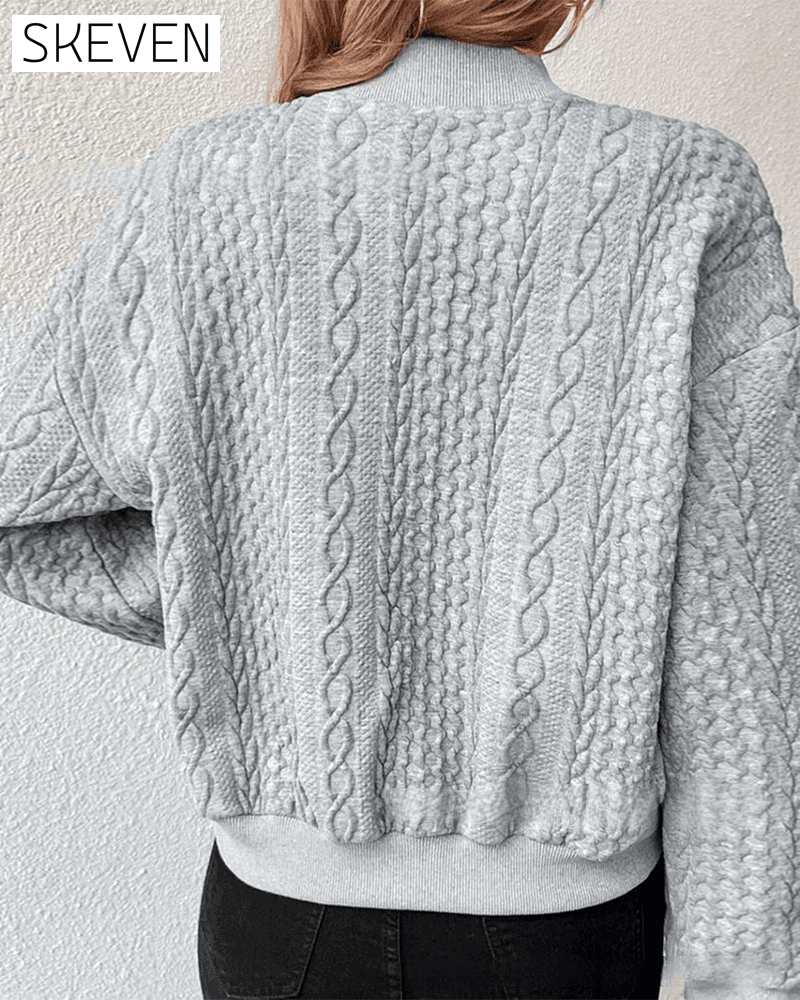 Einfarbige Strickjacke mit Knopfleiste