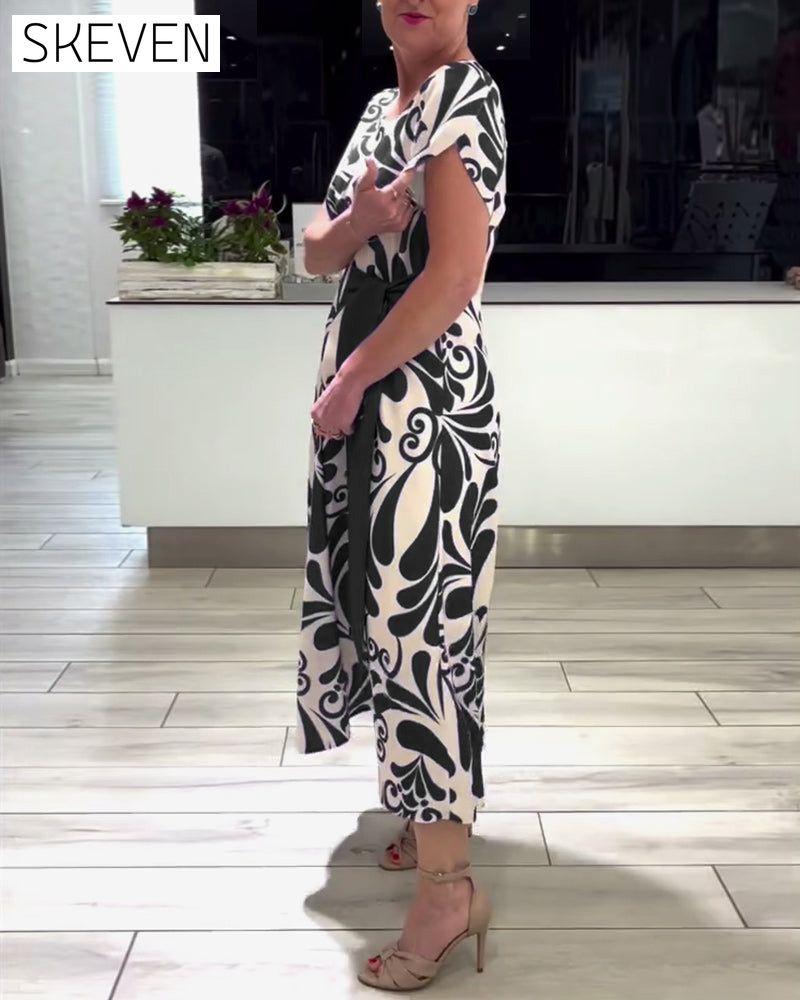 Elegantes Kurzarmkleid mit Kontrastprint
