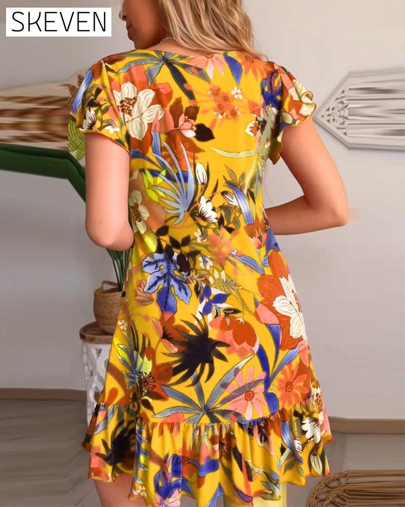 robe fleurie à col en V et à volants