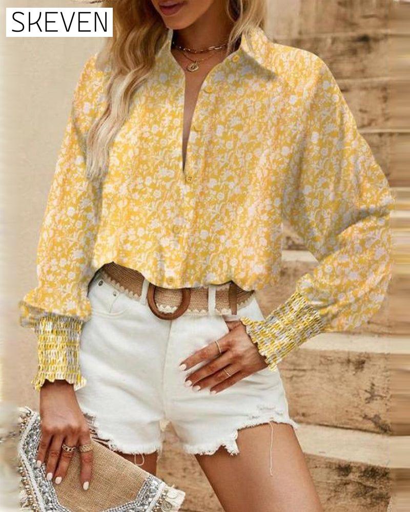 Bluse im Retro-Stil mit Knöpfen und Blumenmuster
