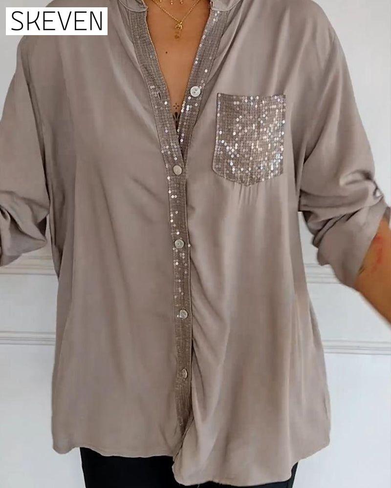 Paneled sequin button casual top