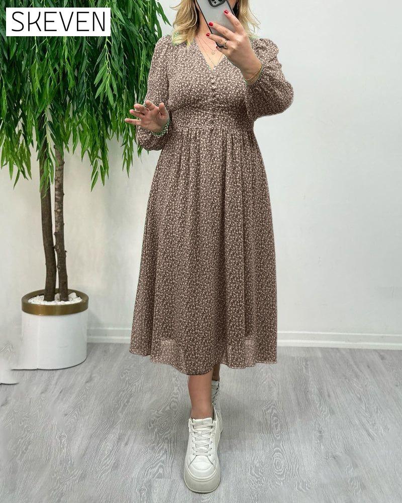 Elegantes Kleid mit Print und Knöpfen