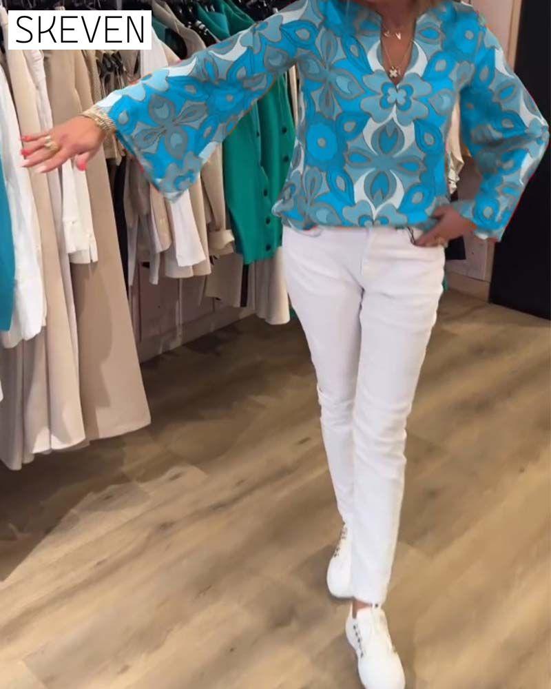 Lockere und vielseitige bedruckte Bluse