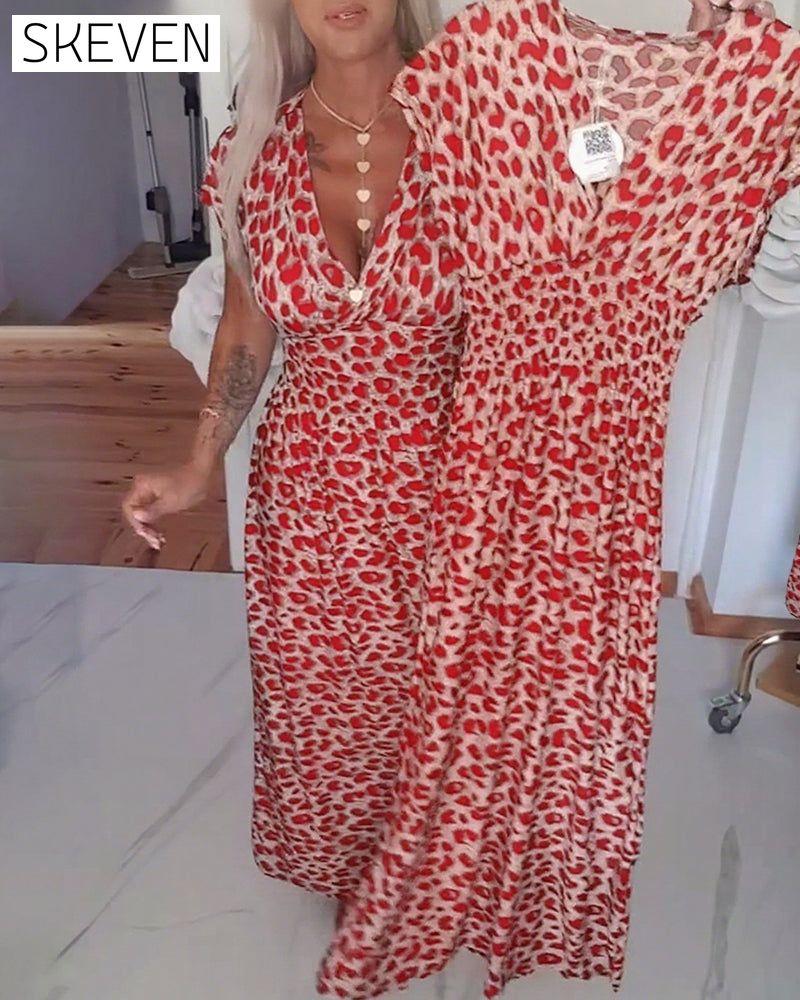 Elegantes Kleid mit Leopardenmuster und V-Ausschnitt