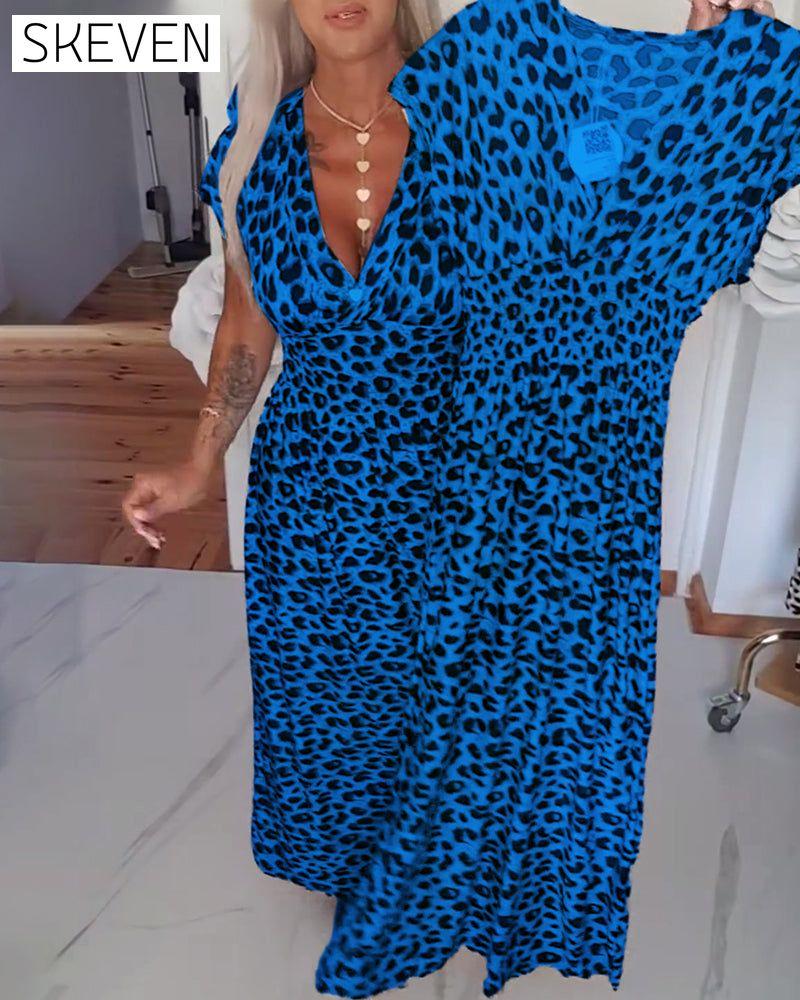 Elegantes Kleid mit Leopardenmuster und V-Ausschnitt