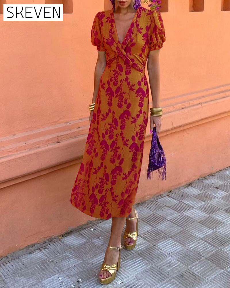 Elegantes A-Linien-Kleid mit Blätterprint, tiefem V-Ausschnitt und Puffärmeln
