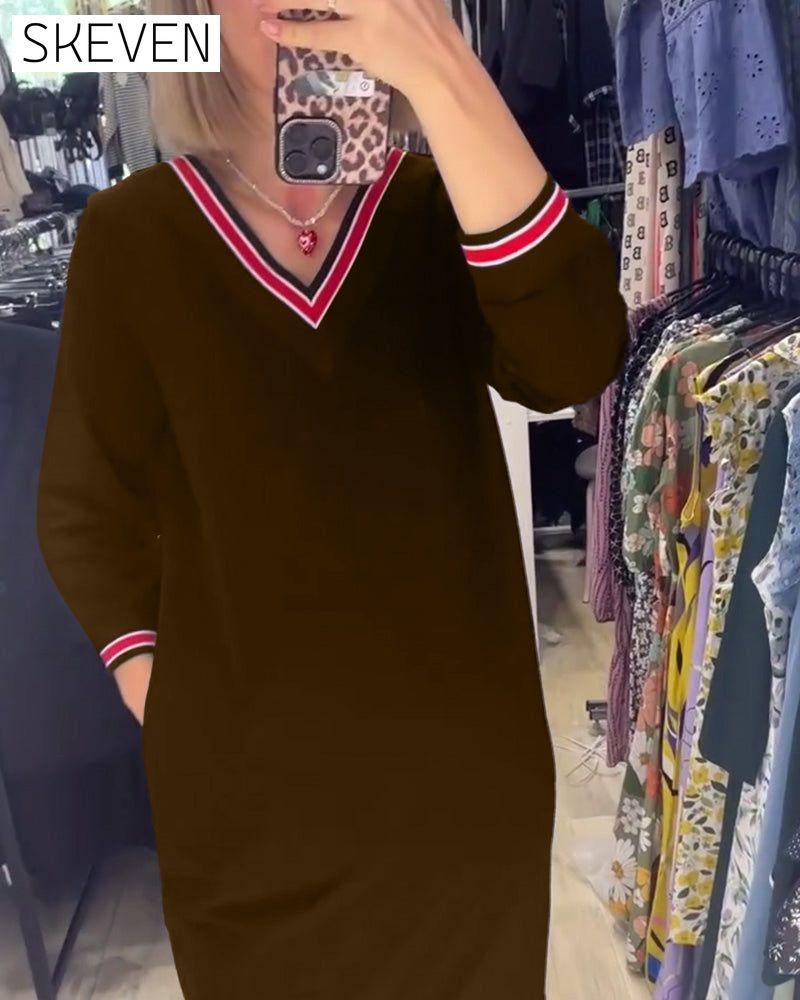 Robe élégante à col en V avec poches