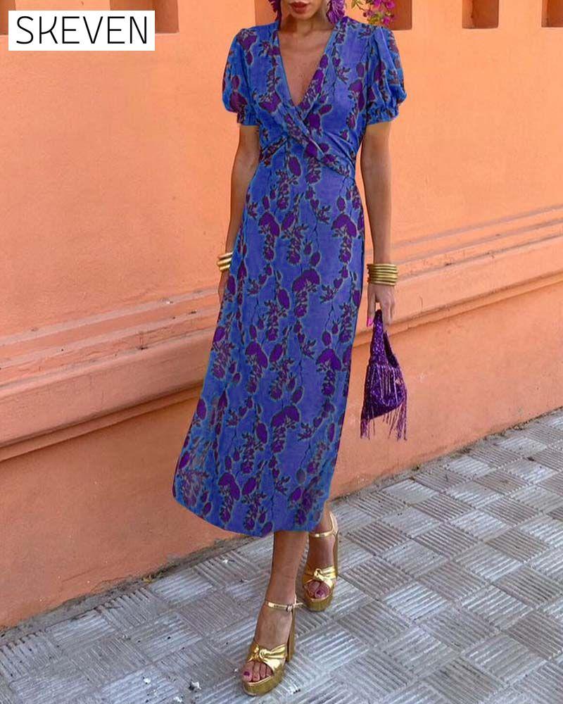 Elegantes A-Linien-Kleid mit Blätterprint, tiefem V-Ausschnitt und Puffärmeln