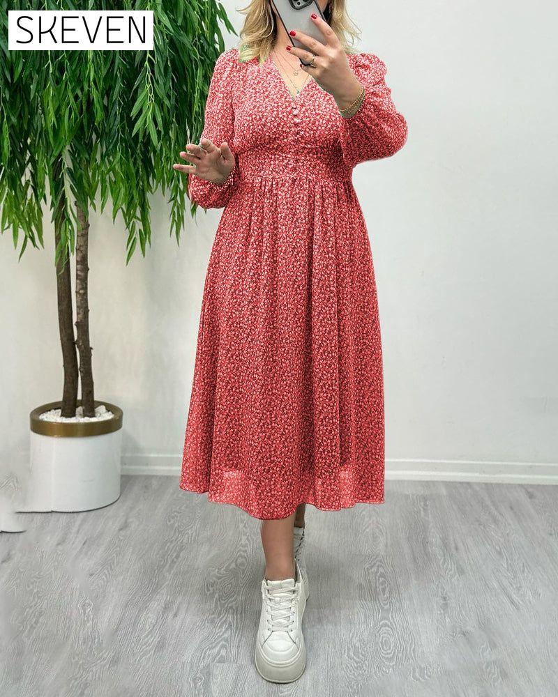 Elegantes Kleid mit Print und Knöpfen