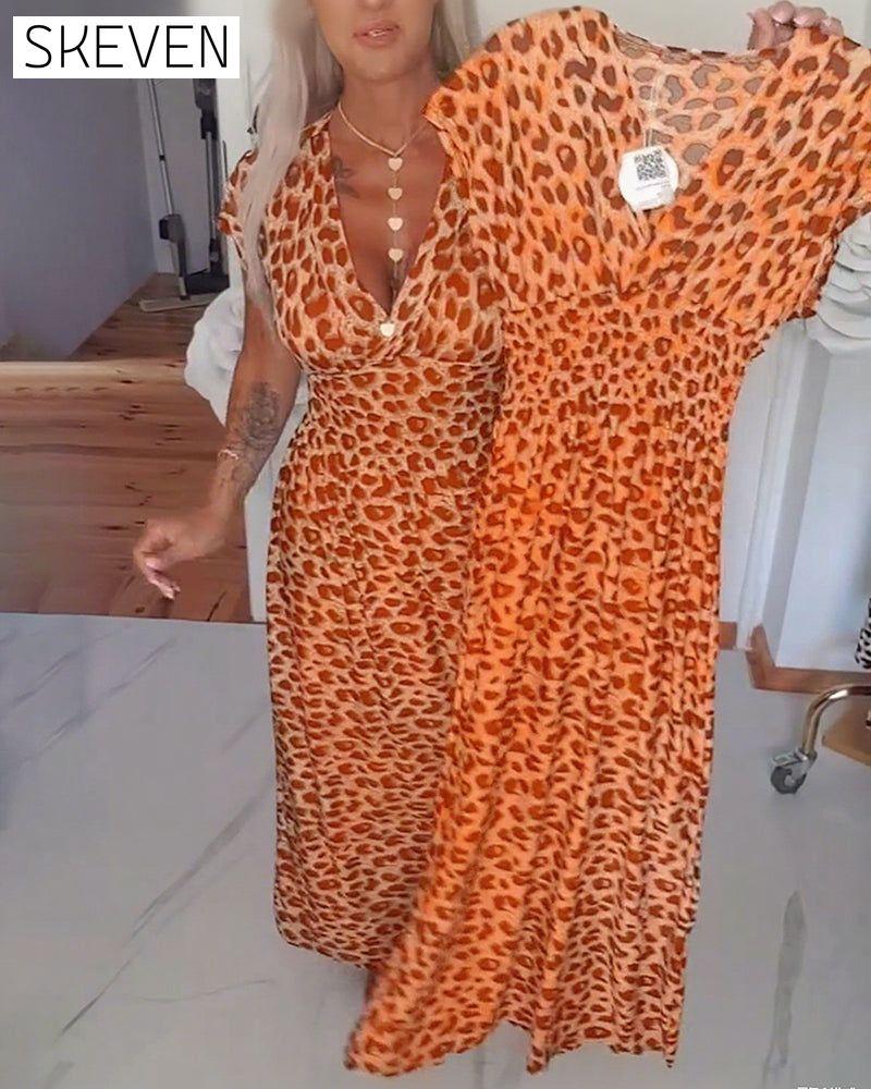 Elegantes Kleid mit Leopardenmuster und V-Ausschnitt