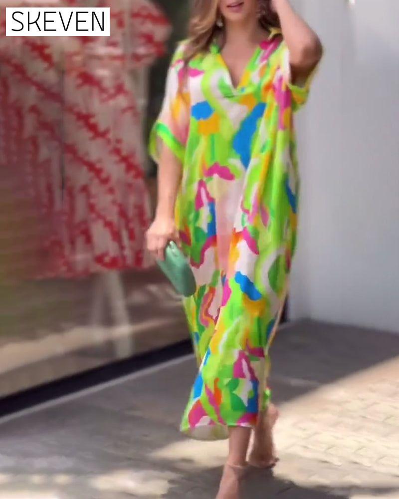 Bedrucktes, lässiges Kleid mit halblangen Ärmeln und Reverskragen