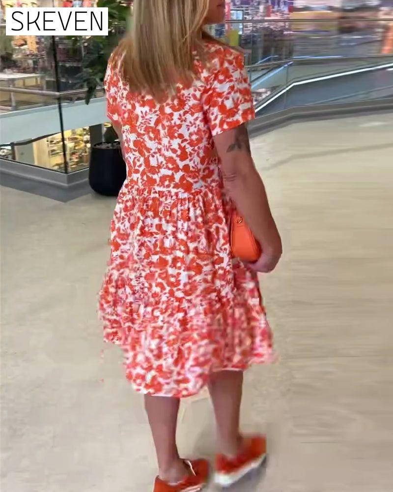 Kurzärmeliges geblümtes Midikleid