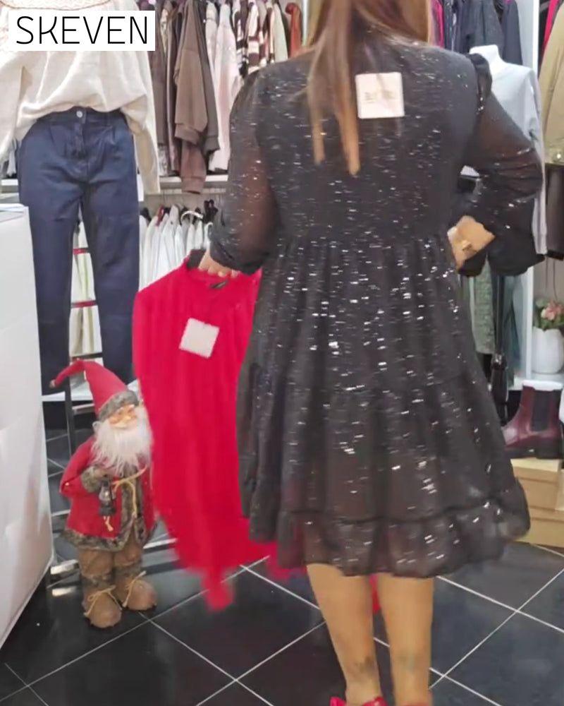 schimmerndes Modekleid mit Laternenärmeln