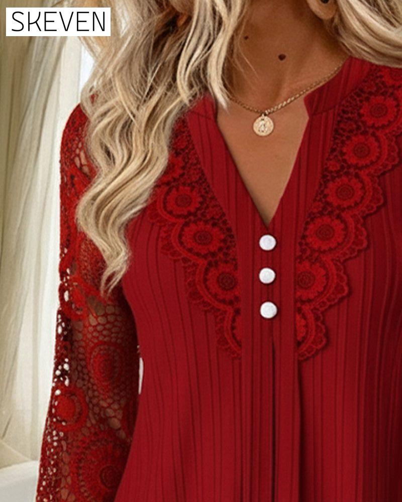 Kleid mit V-Ausschnitt und Spitzenbesatz