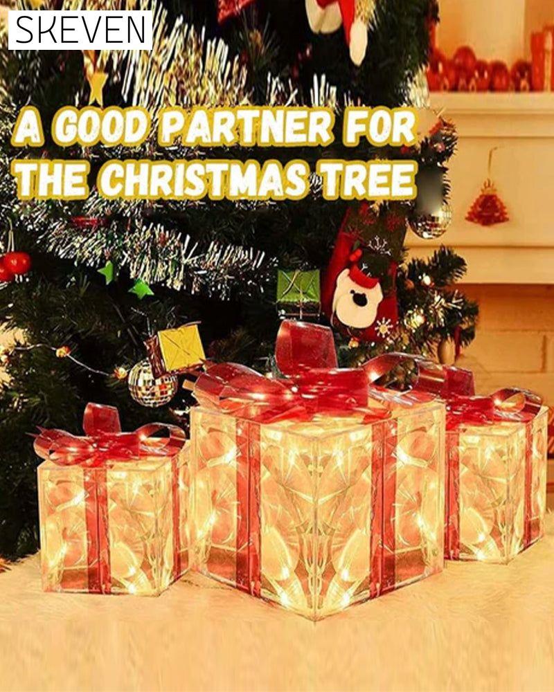 Weihnachtsdekorationen in Form von leuchtenden Geschenkboxen