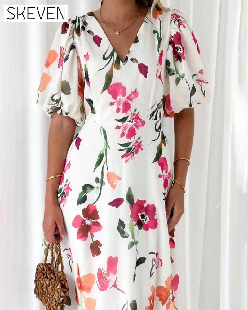 Elegantes Kleid mit Puffärmeln und Blumenmuster