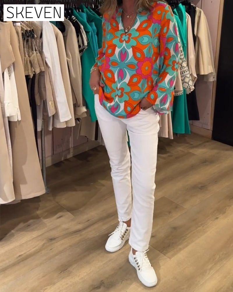 Lockere und vielseitige bedruckte Bluse