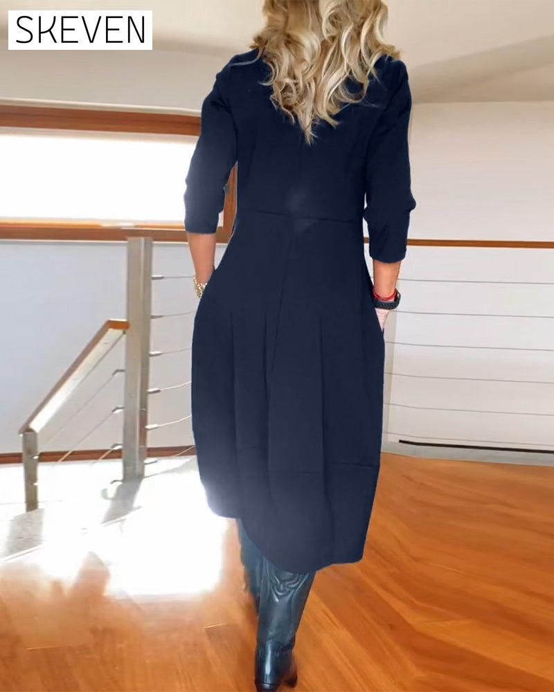 Elegantes, einfarbiges Kleid mit Rundhalsausschnitt und Taschen