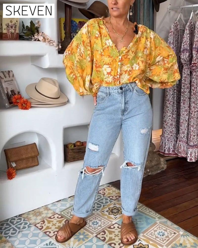 Bluse mit V-Ausschnitt und Blumenmuster