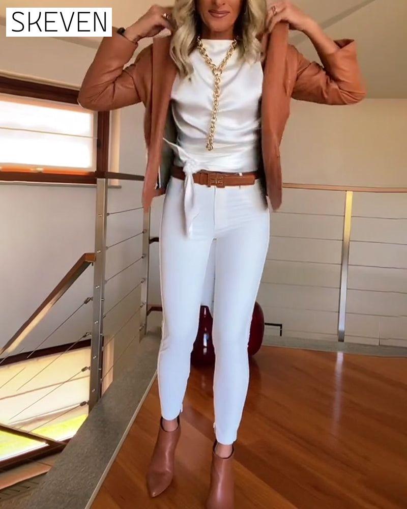 Sleeveless pleated knotted solid top