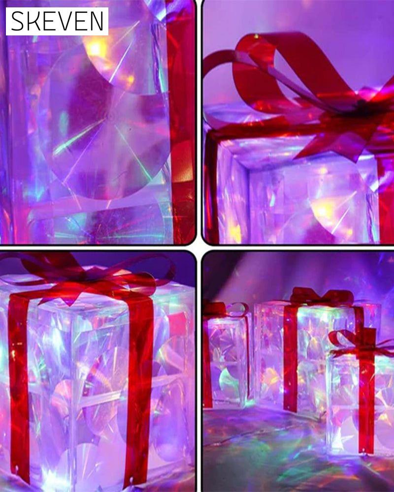 Weihnachtsdekorationen in Form von leuchtenden Geschenkboxen