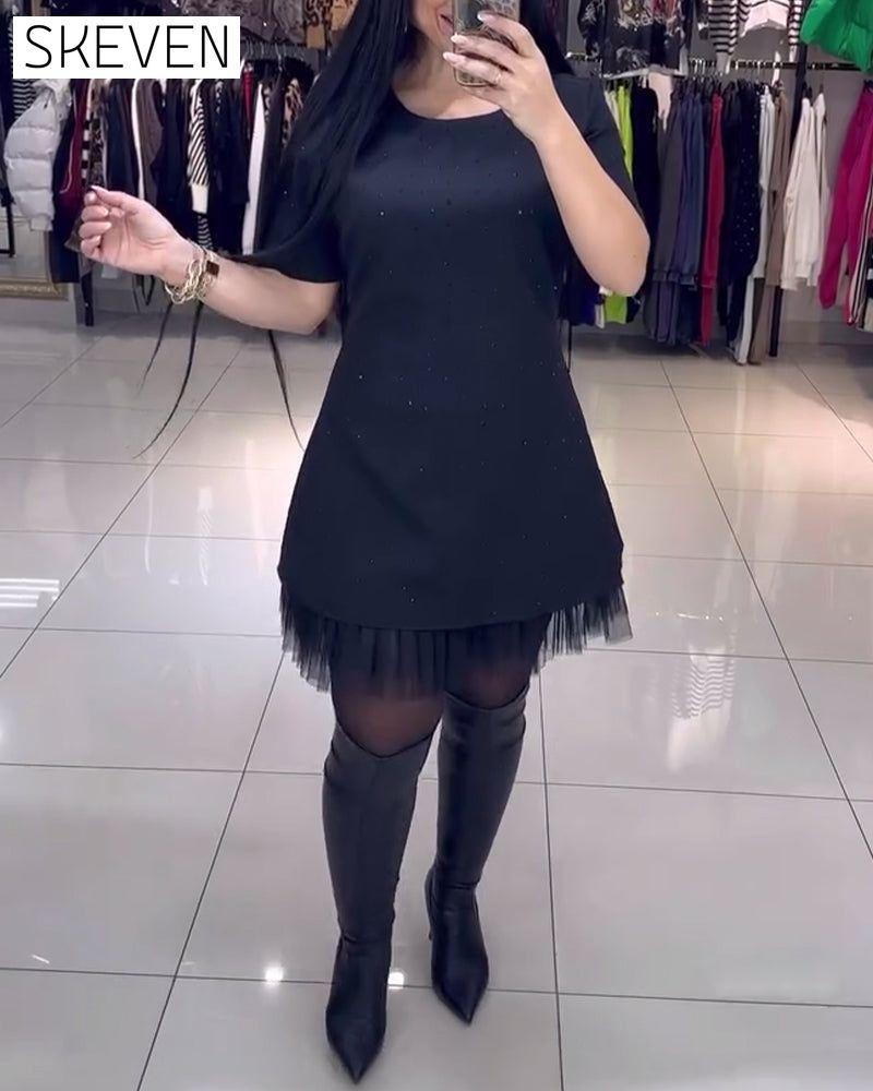 Robe à manches courtes en maille et coutures perlées