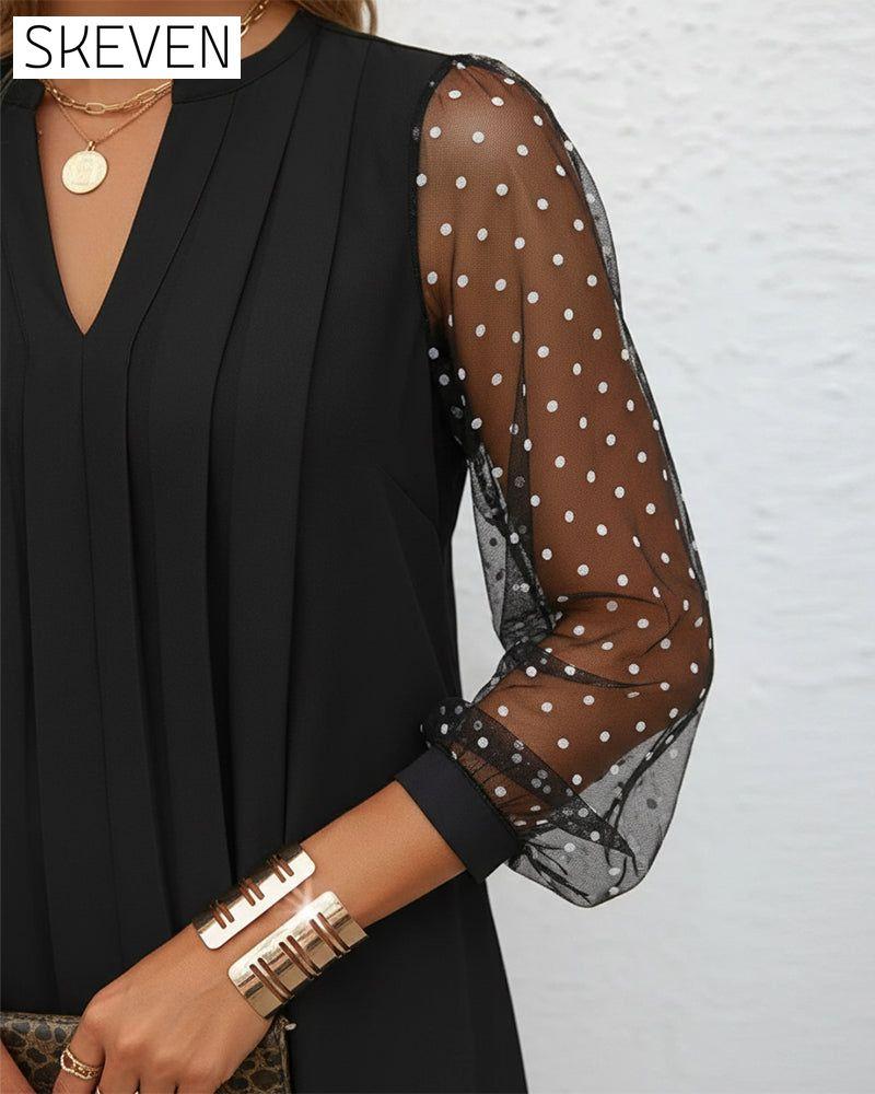 Figurformendes Kleid aus Mesh mit V-Ausschnitt
