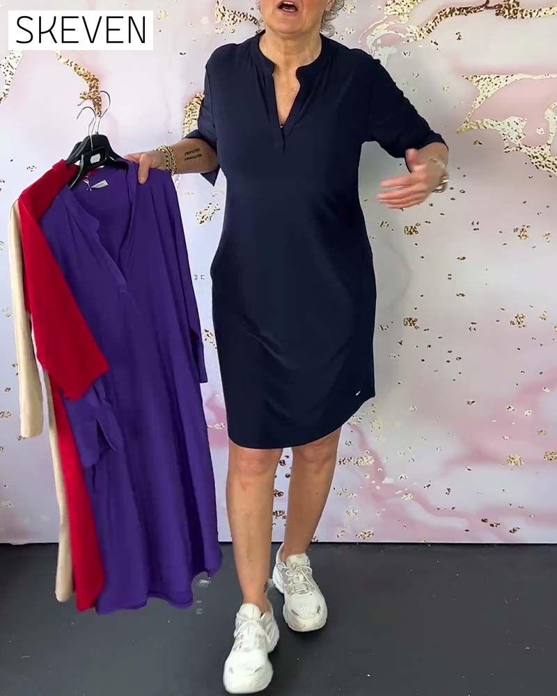 einfarbiges Kleid mit V-Ausschnitt