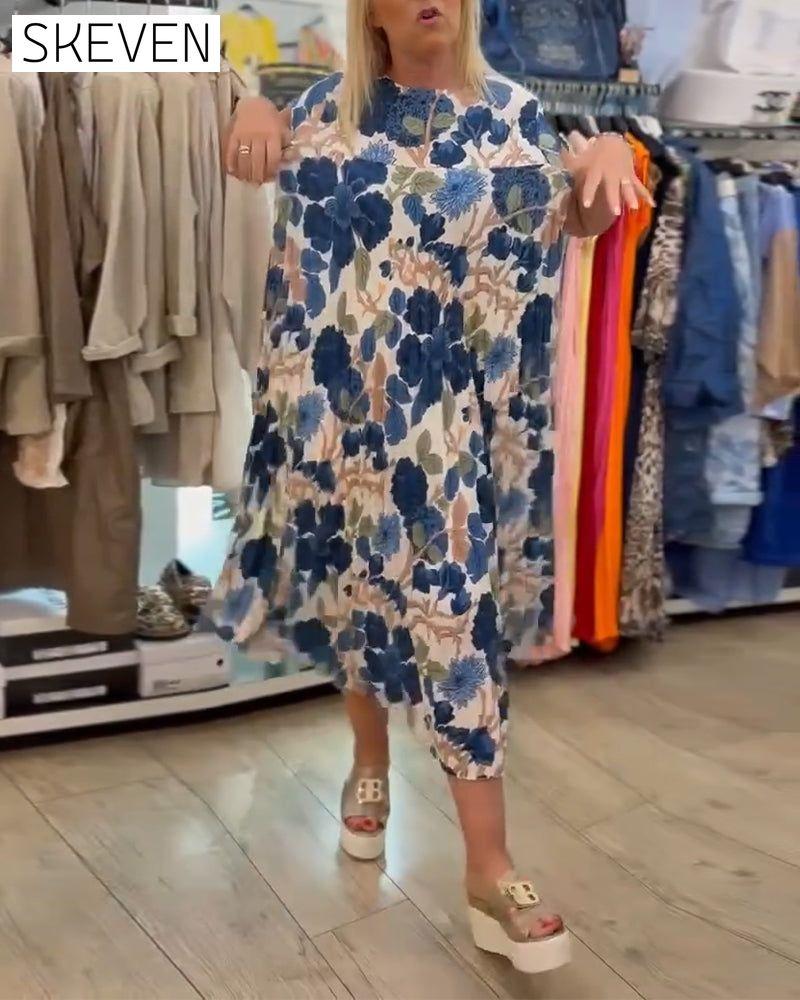 Elegantes Kleid mit Rundhalsausschnitt und Blumenmuster