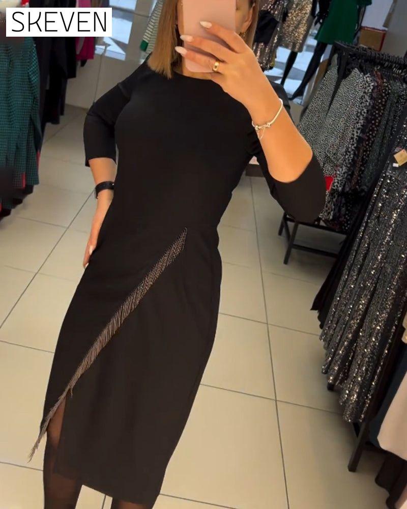 Robe à col rond et fente oblique