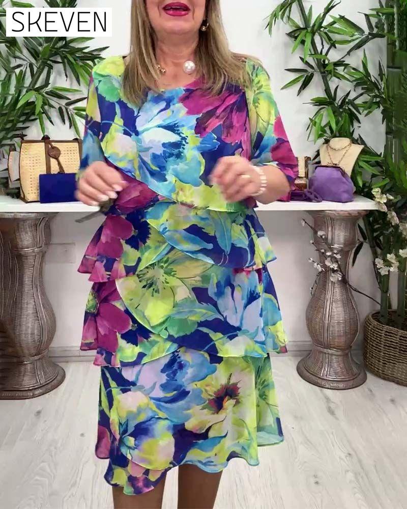 Kleid mit Blumenmuster, Rundhalsausschnitt und Rüschen an den halben Ärmeln