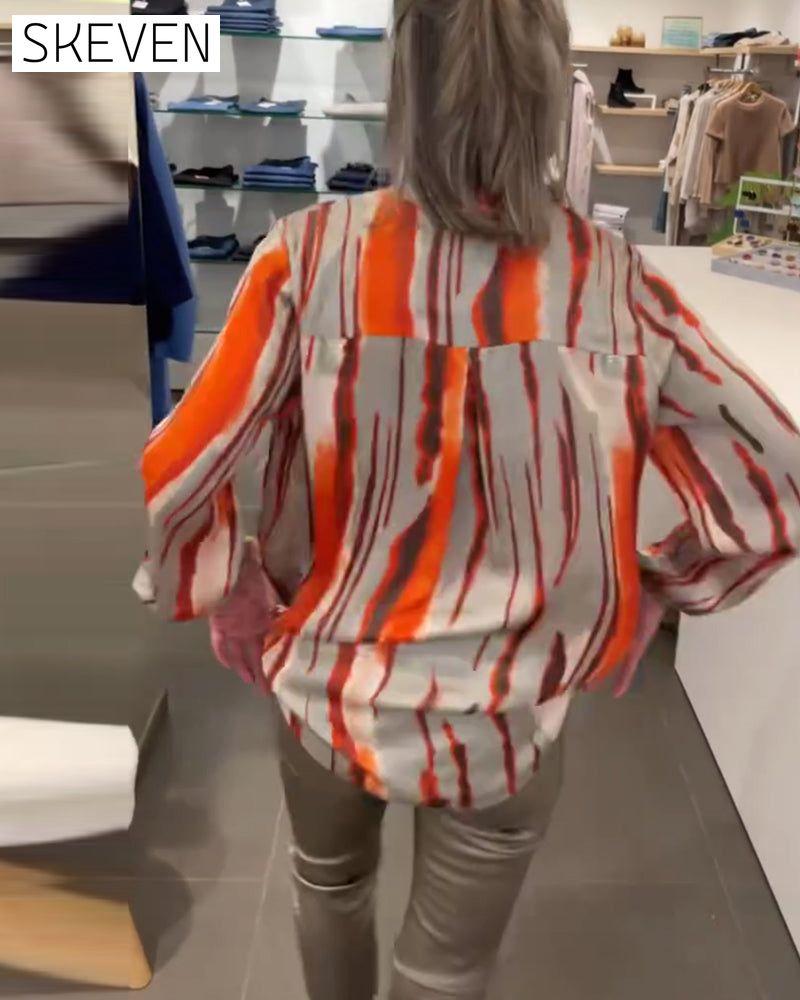 Long sleeve striped print blouse