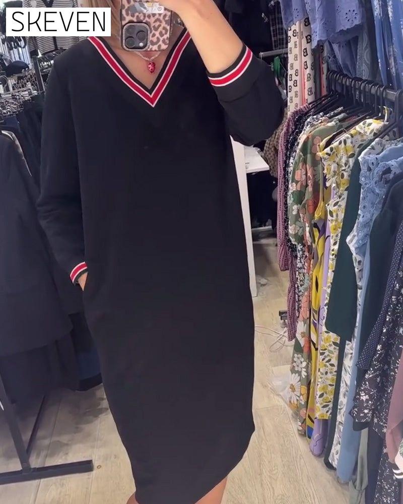 Robe élégante à col en V avec poches