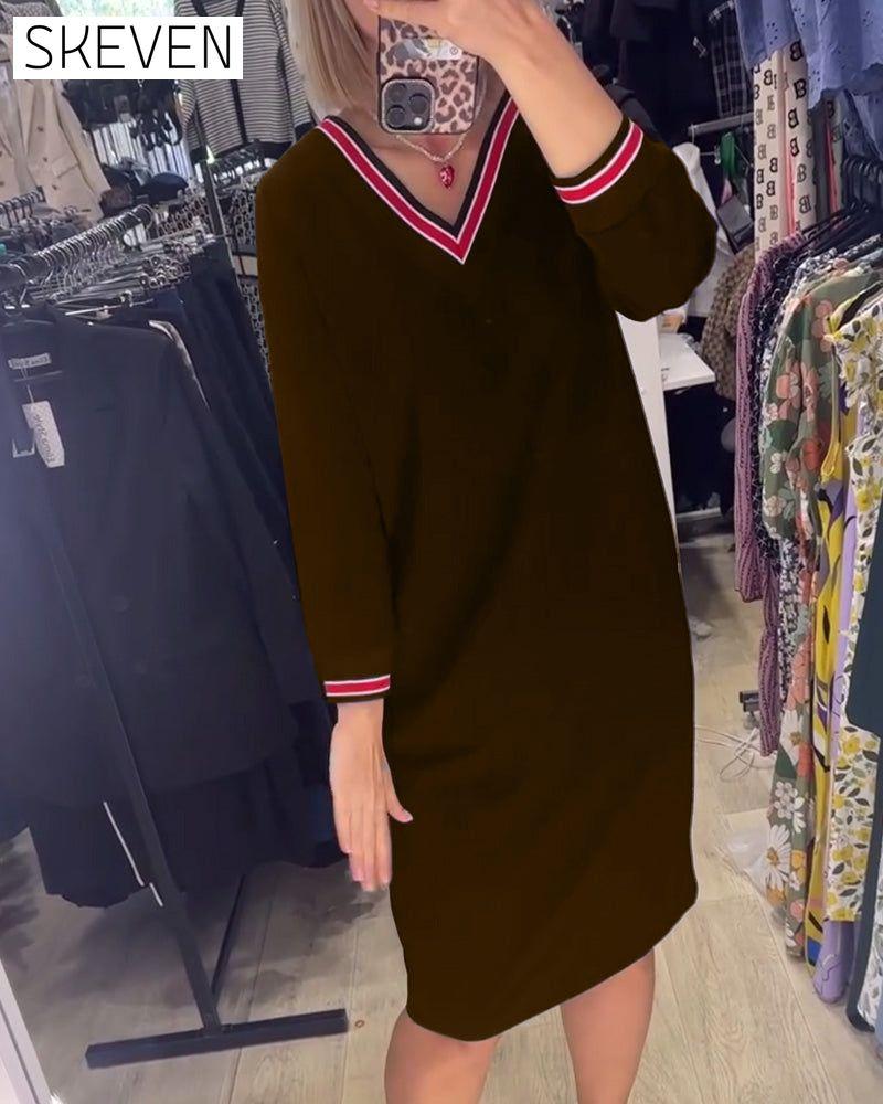 Robe élégante à col en V avec poches
