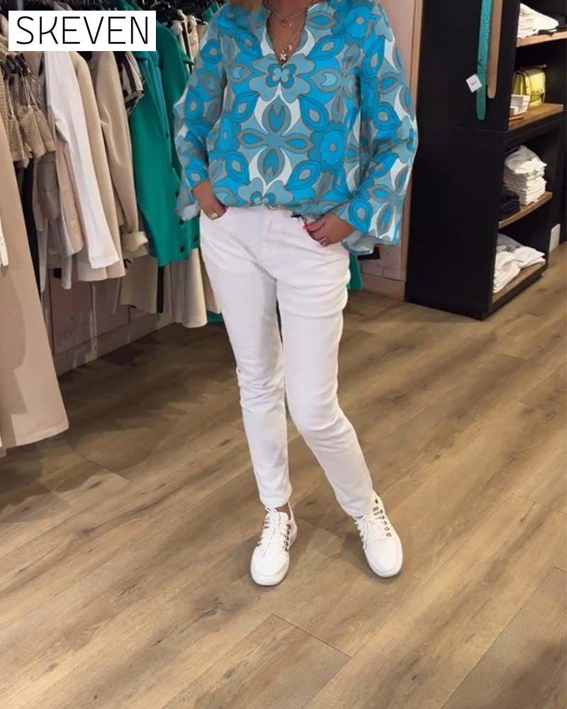 Lockere und vielseitige bedruckte Bluse