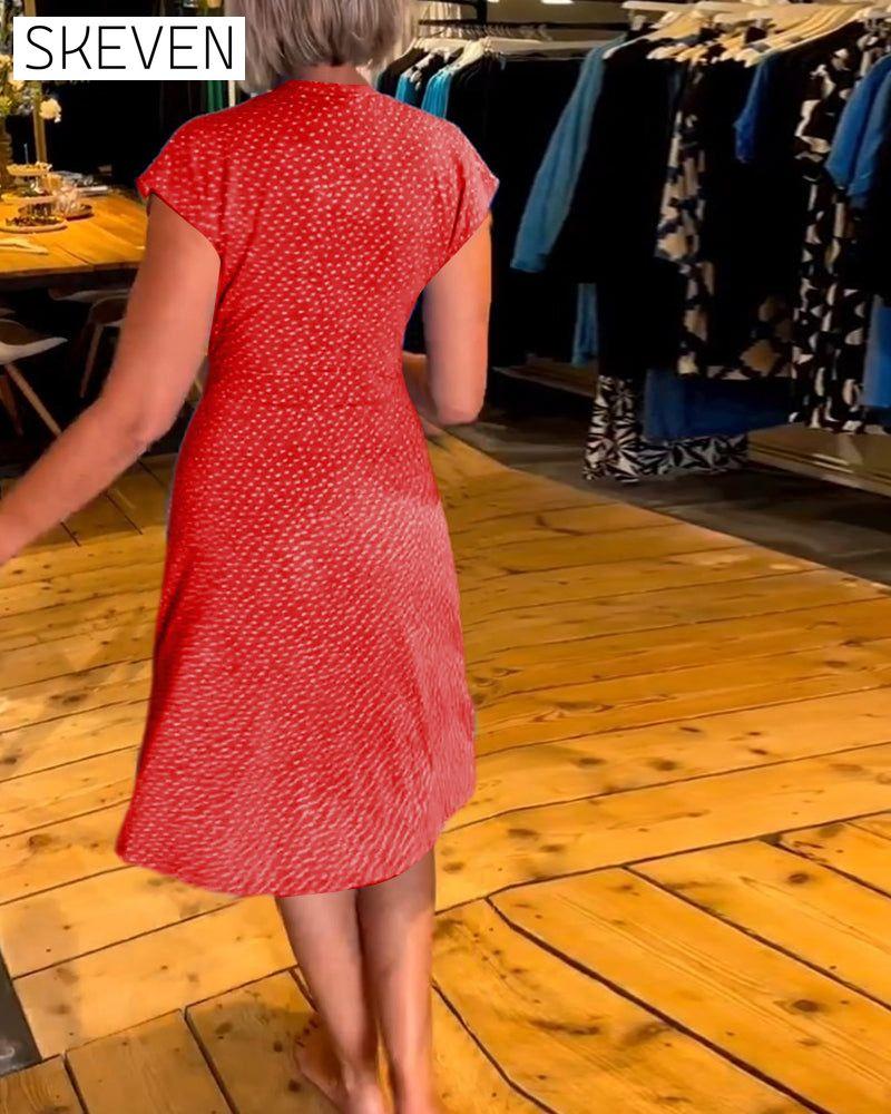 robe à pois à manches courtes et col en V