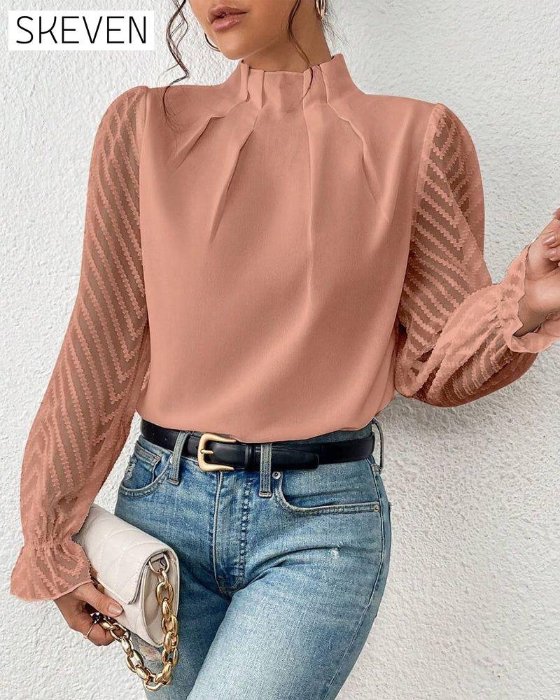 Paneled wave pattern long-sleeved top
