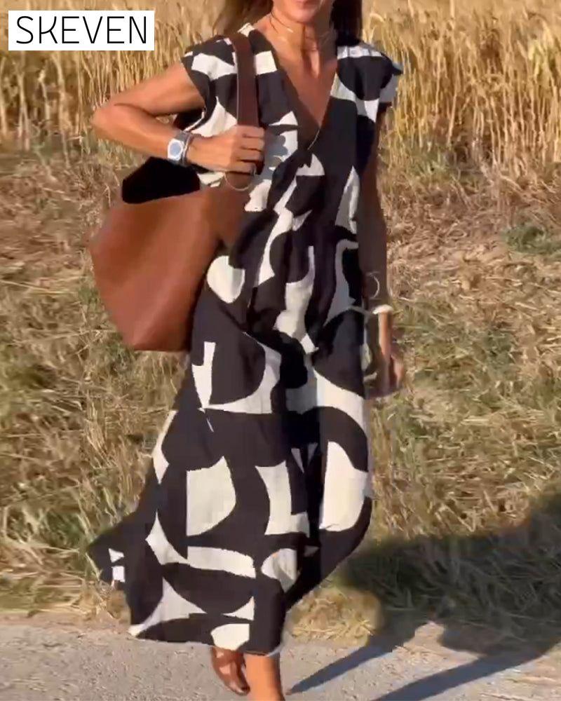 bedrucktes Kleid mit V-Ausschnitt