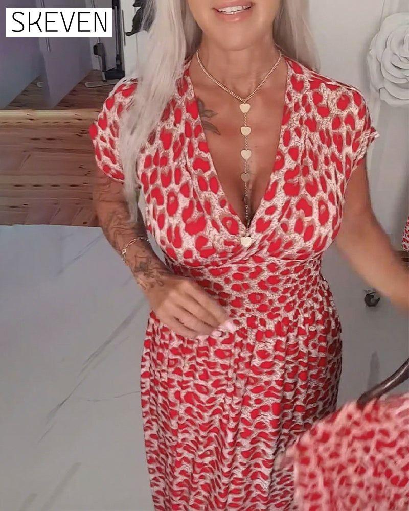 Elegantes Kleid mit Leopardenmuster und V-Ausschnitt