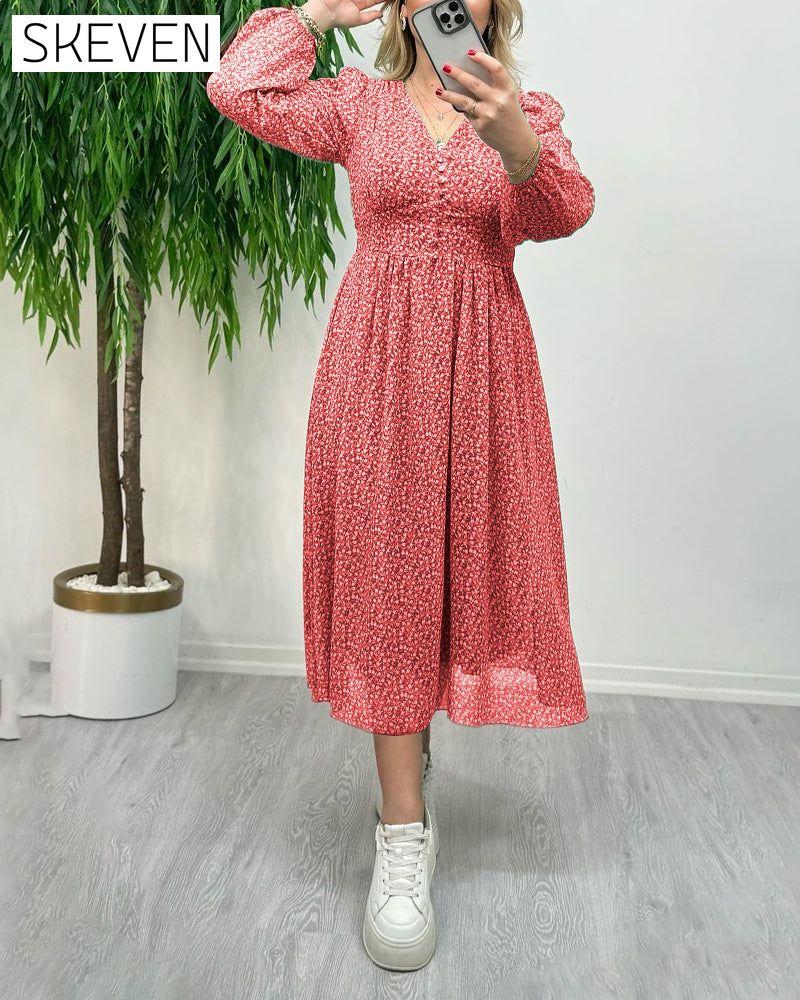 Elegantes Kleid mit Print und Knöpfen