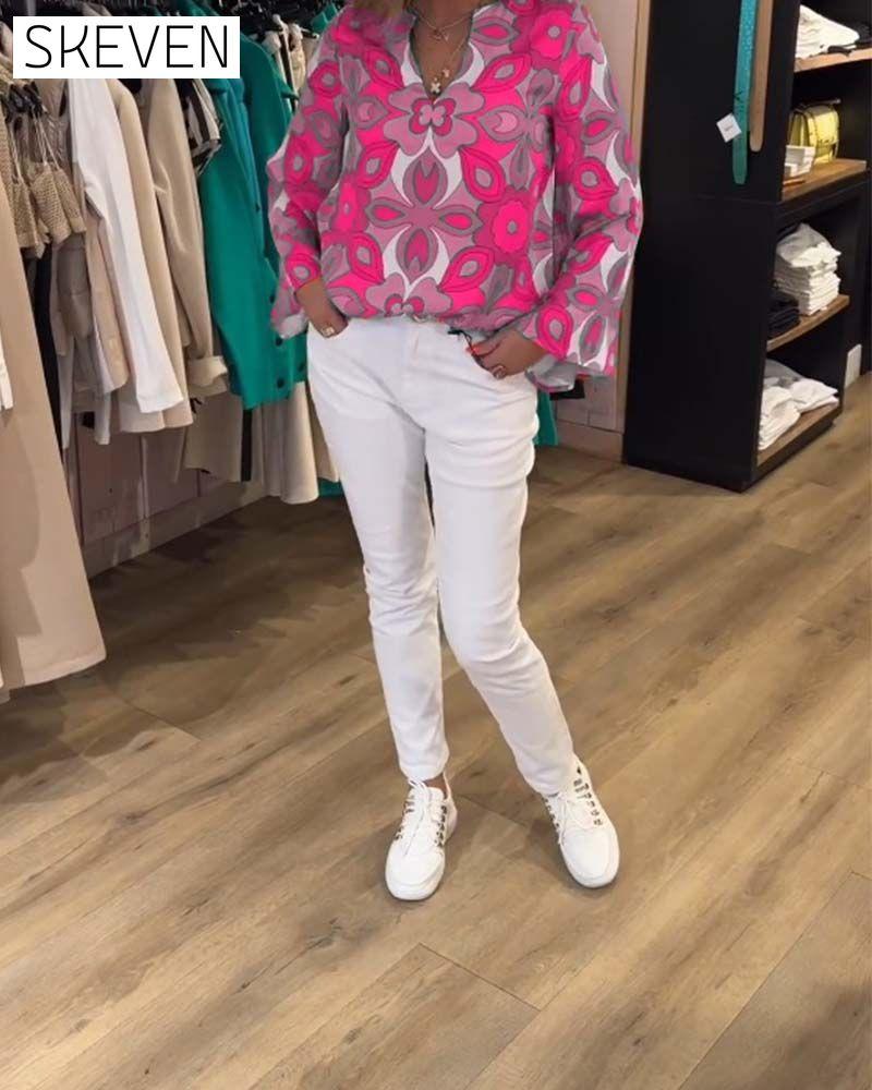 Lockere und vielseitige bedruckte Bluse