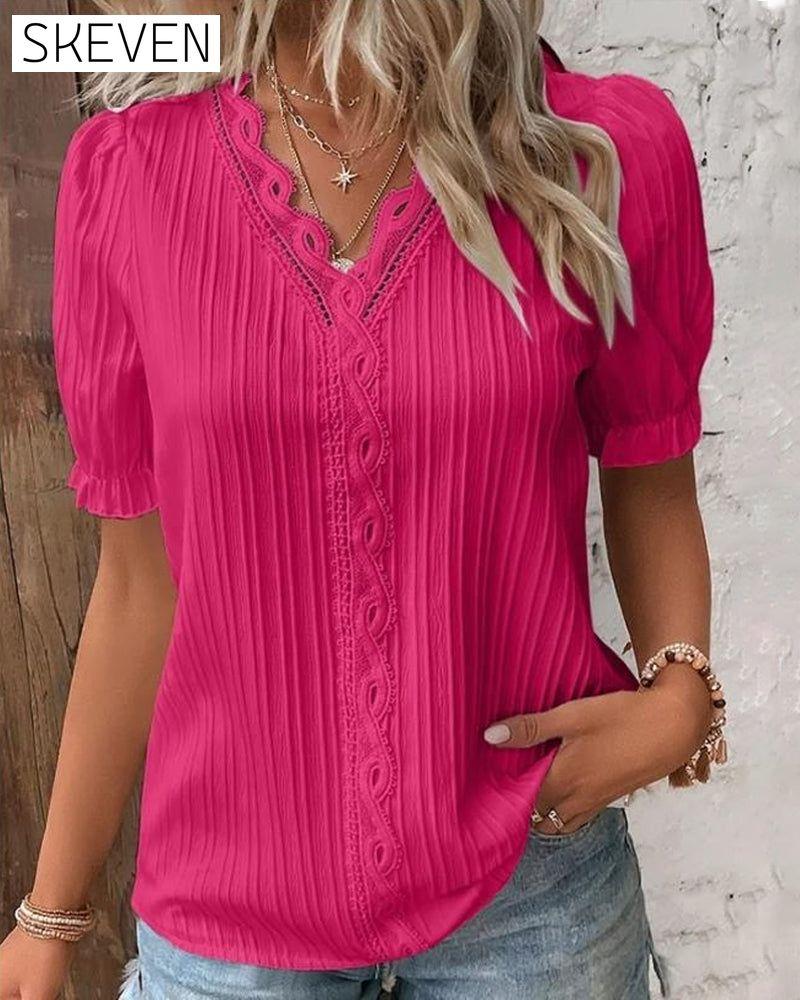 Elegantes Spitzentop mit V-Ausschnitt