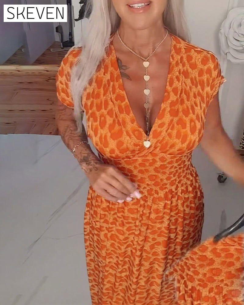 Elegantes Kleid mit Leopardenmuster und V-Ausschnitt