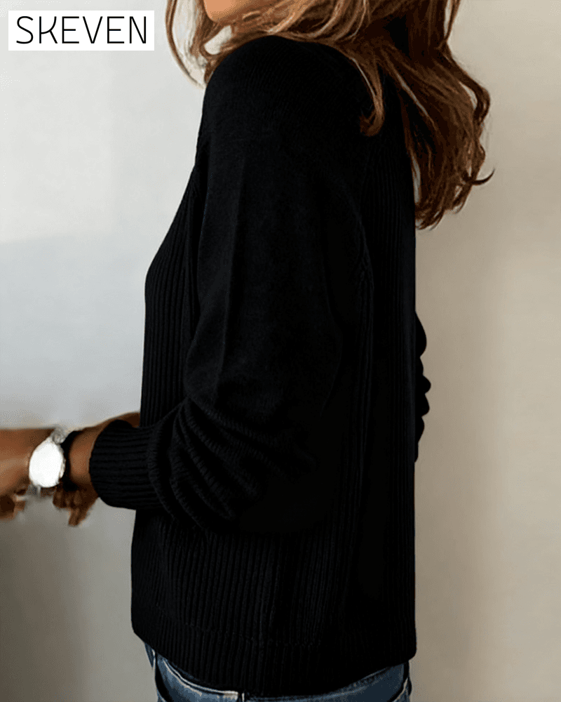 Stilvoller Pullover mit Raglanärmeln und Knopfleiste
